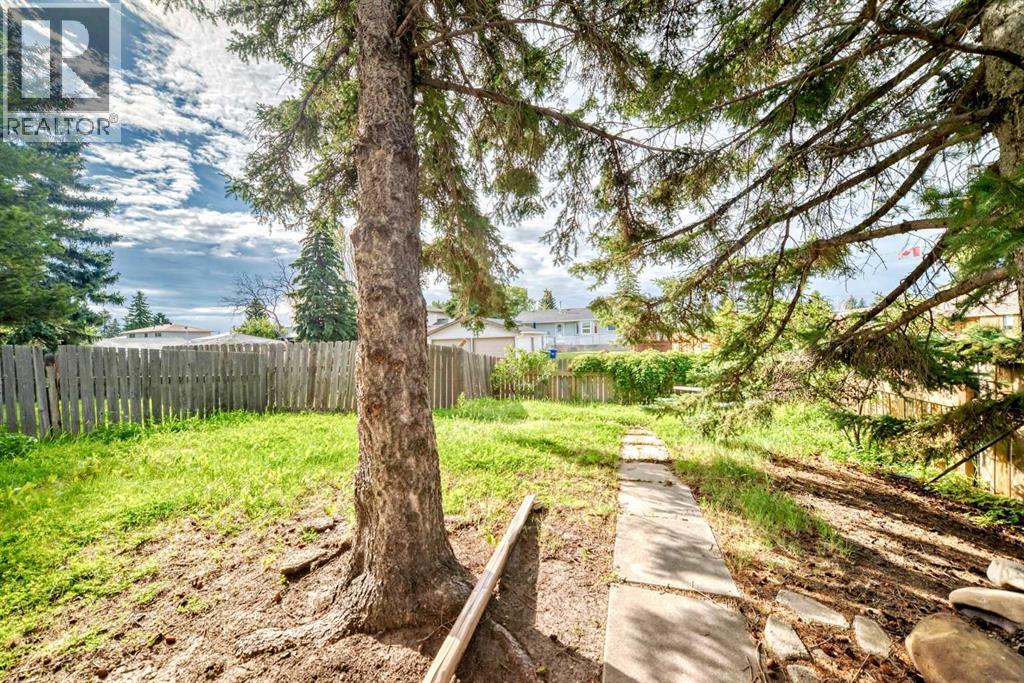 Multi-family House Bi-level for Sale in  Rundlehorn Drive NE Pineridge Calgary 