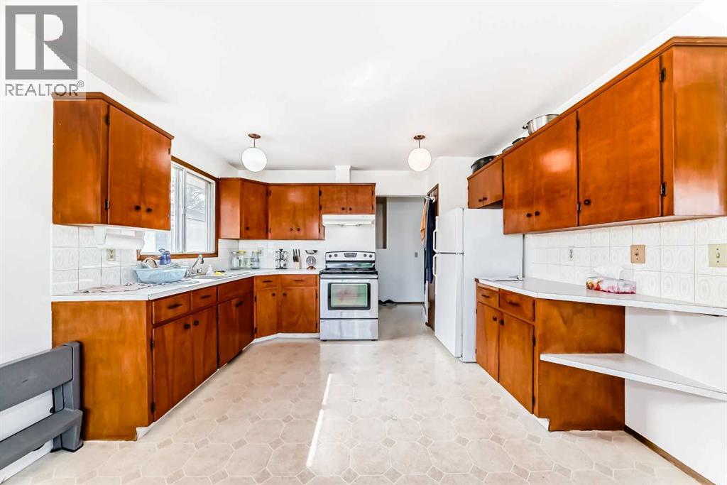 Multi-family House Bi-level for Sale in  Rundlehorn Drive NE Pineridge Calgary 