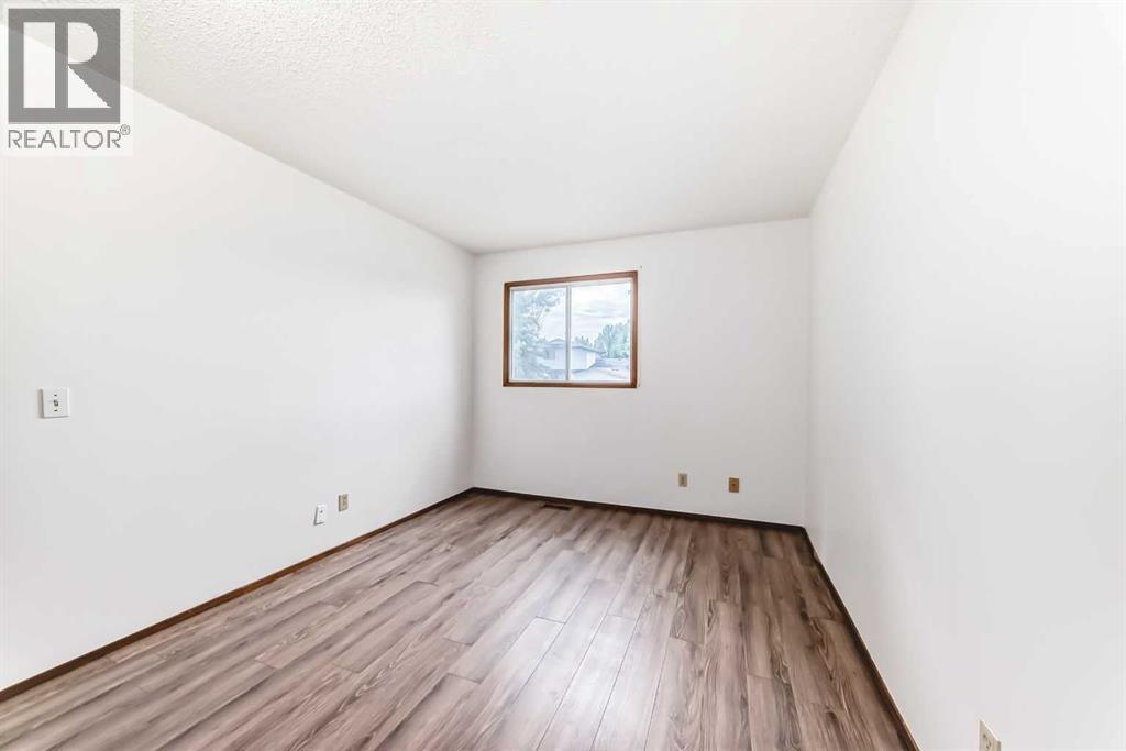 Multi-family House Bi-level for Sale in  Rundlehorn Drive NE Pineridge Calgary 