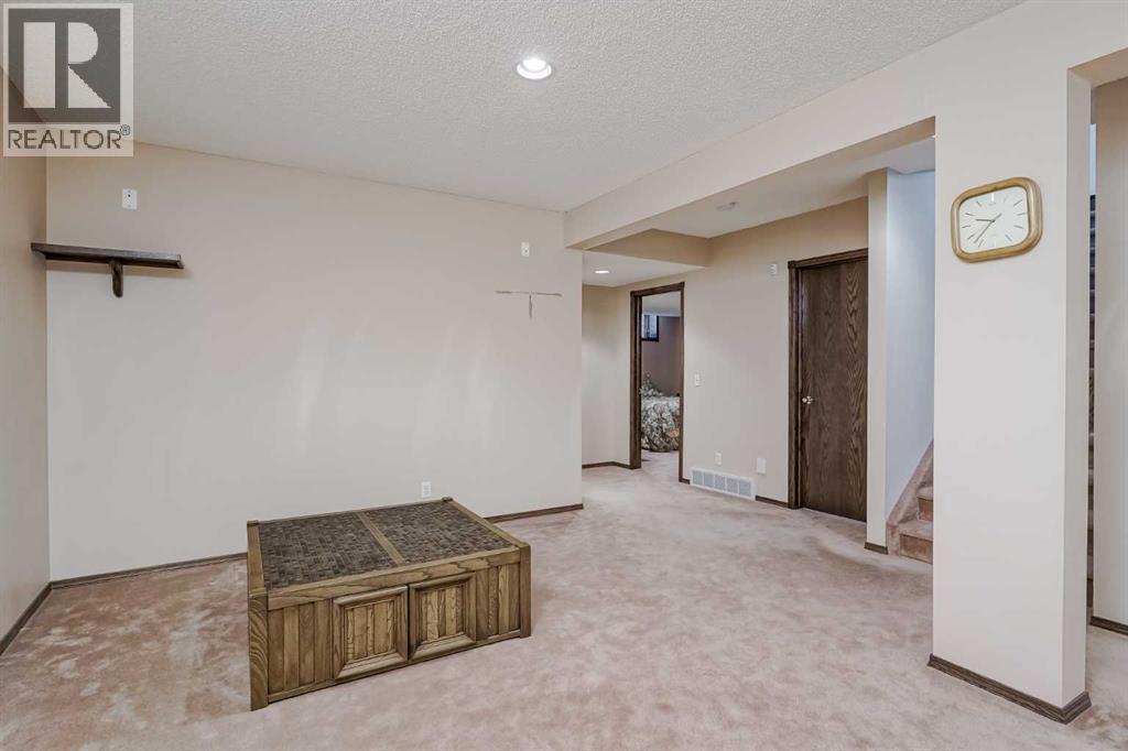Single Family House Bungalow for Sale in  Evergreen Street SW Evergreen Calgary 