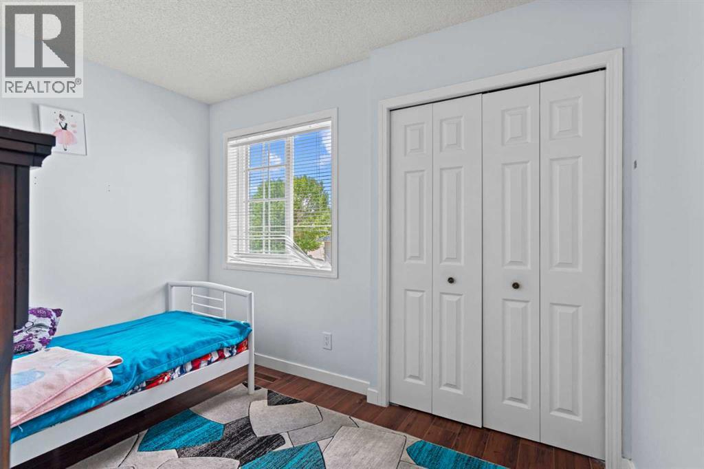 Single Family House 4 Level for Sale in  Laguna Way NE Monterey Park Calgary 