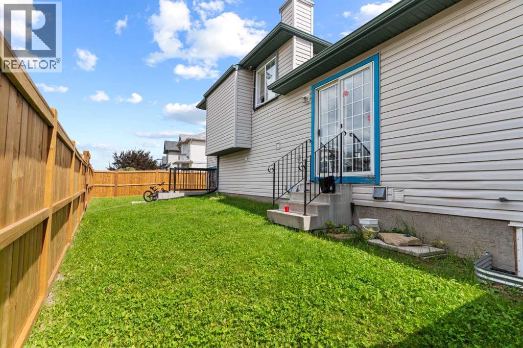 Single Family House 4 Level for Sale in  Laguna Way NE Monterey Park Calgary 