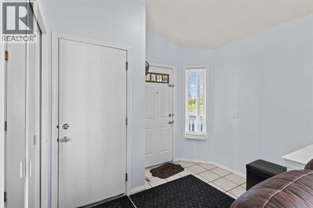 Single Family House 4 Level for Sale in  Laguna Way NE Monterey Park Calgary 