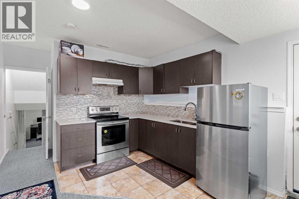 Single Family House 4 Level for Sale in  Laguna Way NE Monterey Park Calgary 