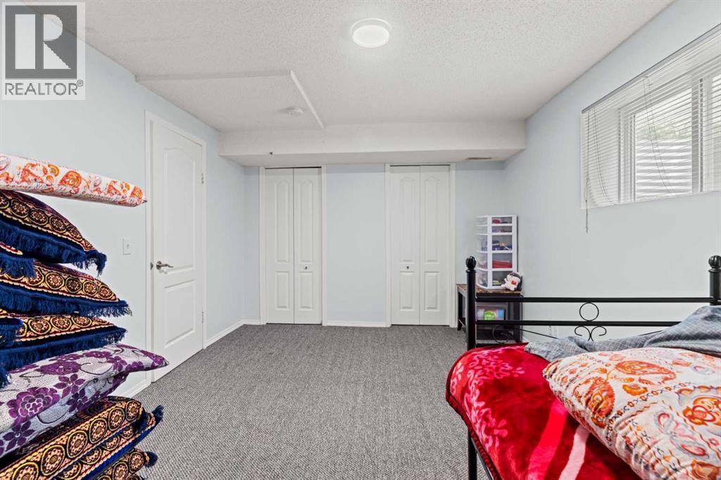 Single Family House 4 Level for Sale in  Laguna Way NE Monterey Park Calgary 