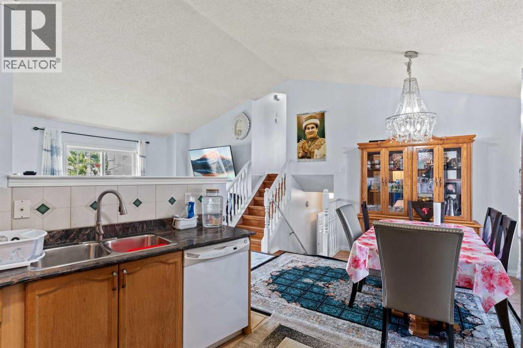 Single Family House 4 Level for Sale in  Laguna Way NE Monterey Park Calgary 