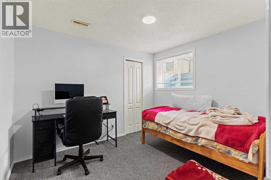 Single Family House 4 Level for Sale in  Laguna Way NE Monterey Park Calgary 