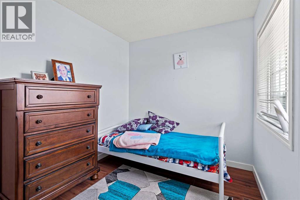 Single Family House 4 Level for Sale in  Laguna Way NE Monterey Park Calgary 