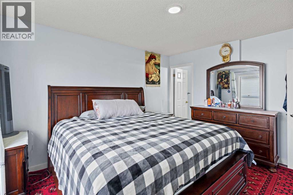 Single Family House 4 Level for Sale in  Laguna Way NE Monterey Park Calgary 