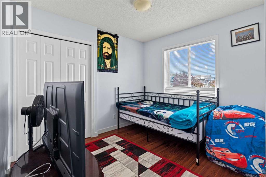Single Family House 4 Level for Sale in  Laguna Way NE Monterey Park Calgary 