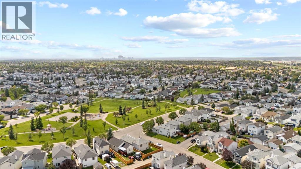Single Family House 4 Level for Sale in  Laguna Way NE Monterey Park Calgary 