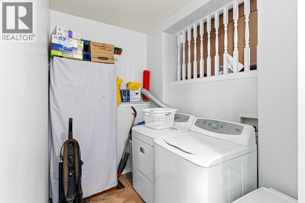 Single Family House 4 Level for Sale in  Laguna Way NE Monterey Park Calgary 