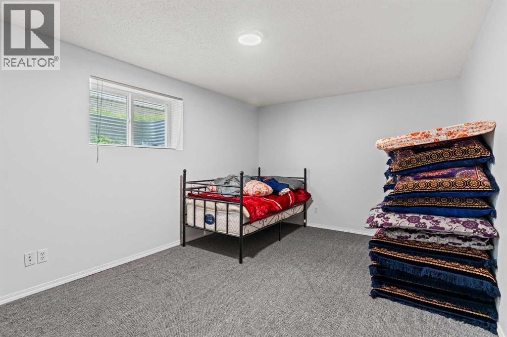 Single Family House 4 Level for Sale in  Laguna Way NE Monterey Park Calgary 