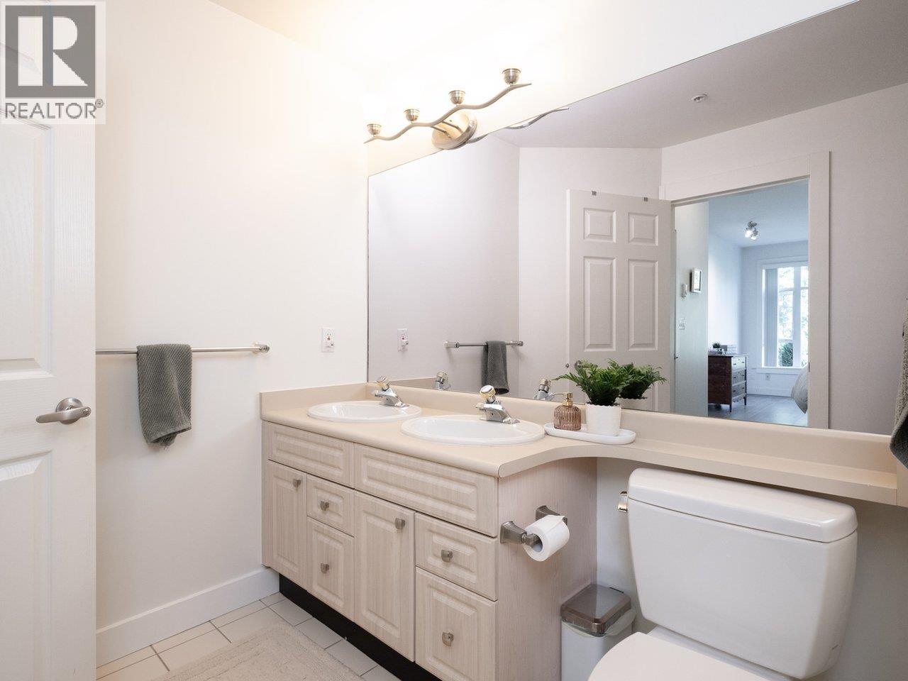 Photo 19 of 204 3600 Windcrest Drive, North Vancouver BC