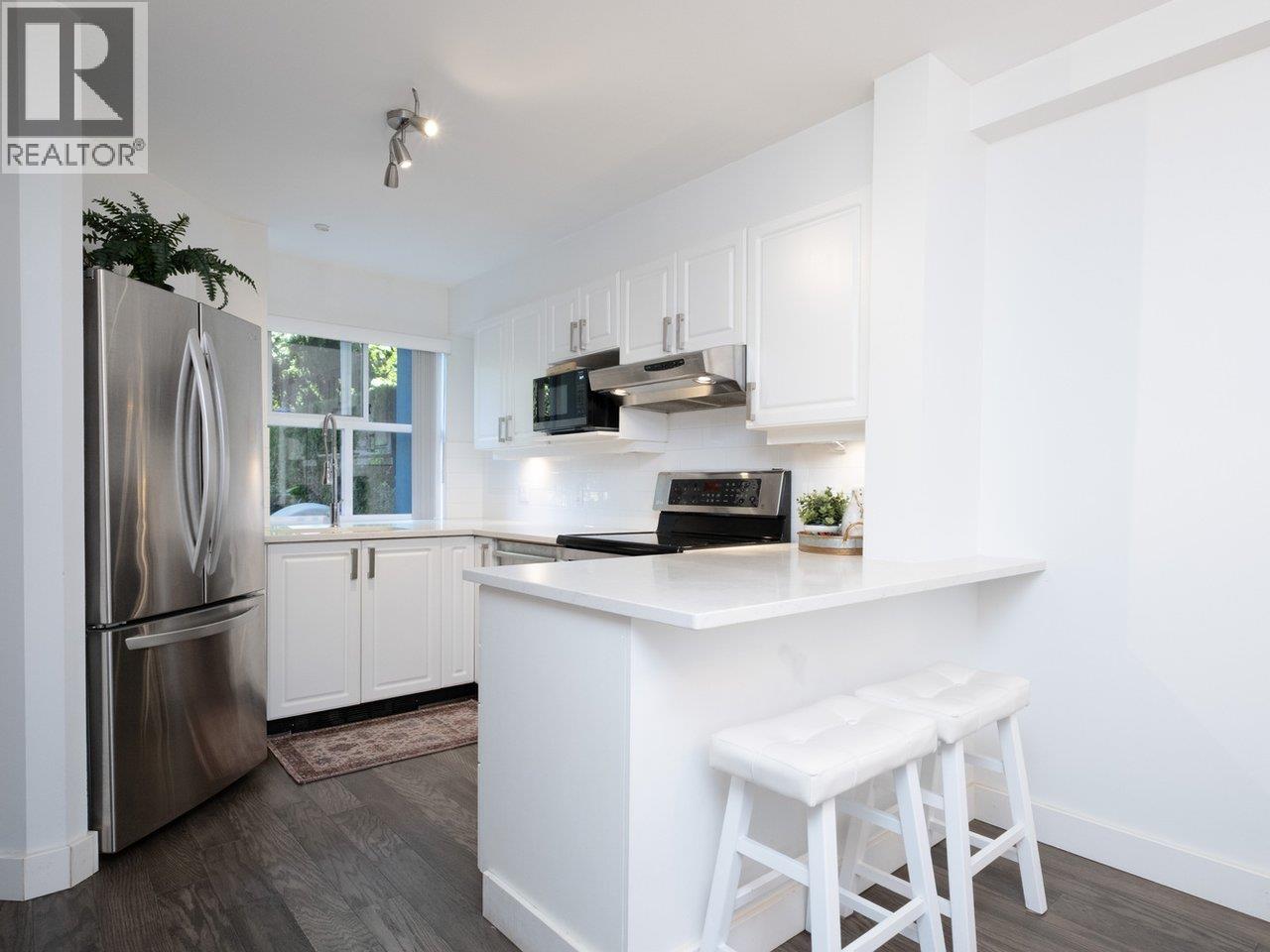 Photo 13 of 204 3600 Windcrest Drive, North Vancouver BC