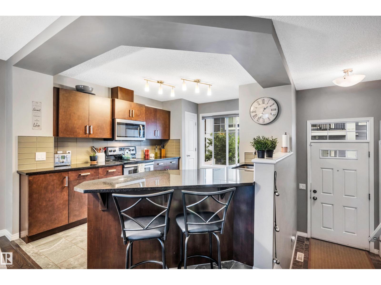 Photo 3 of 19 4050 Savaryn Dr Sw Sw, Edmonton AB