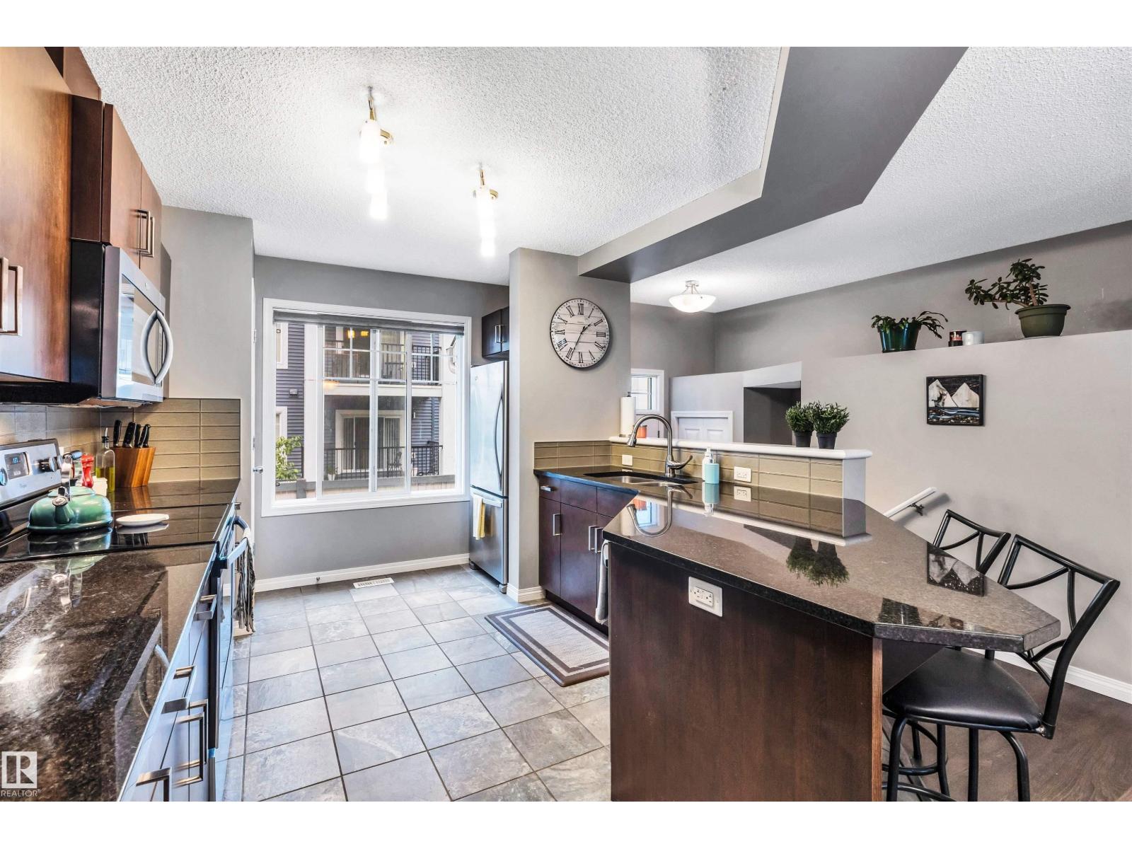 Photo 4 of 19 4050 Savaryn Dr Sw Sw, Edmonton AB