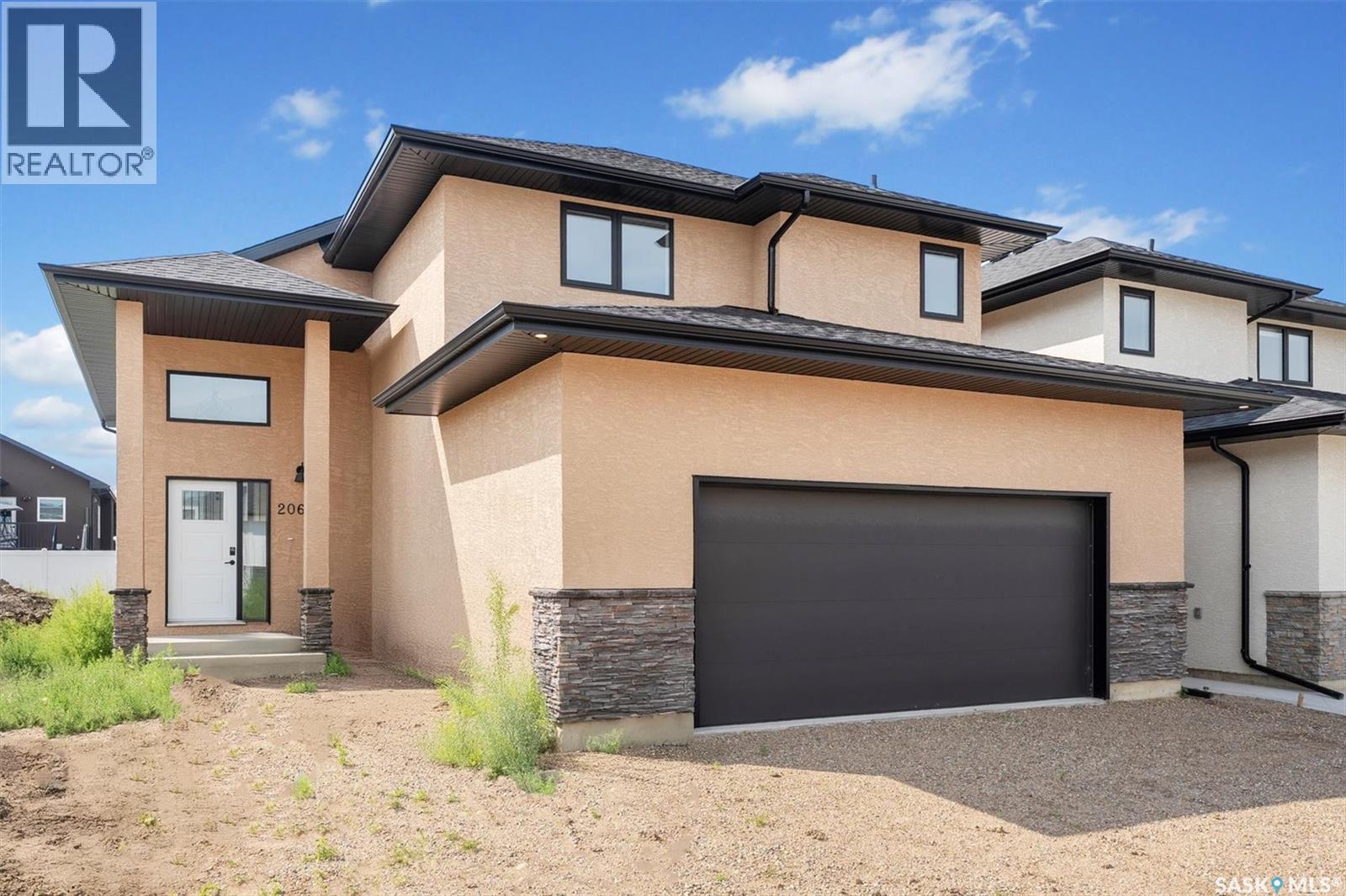 Photo 1 of 206 Flynn Bend, Saskatoon SK