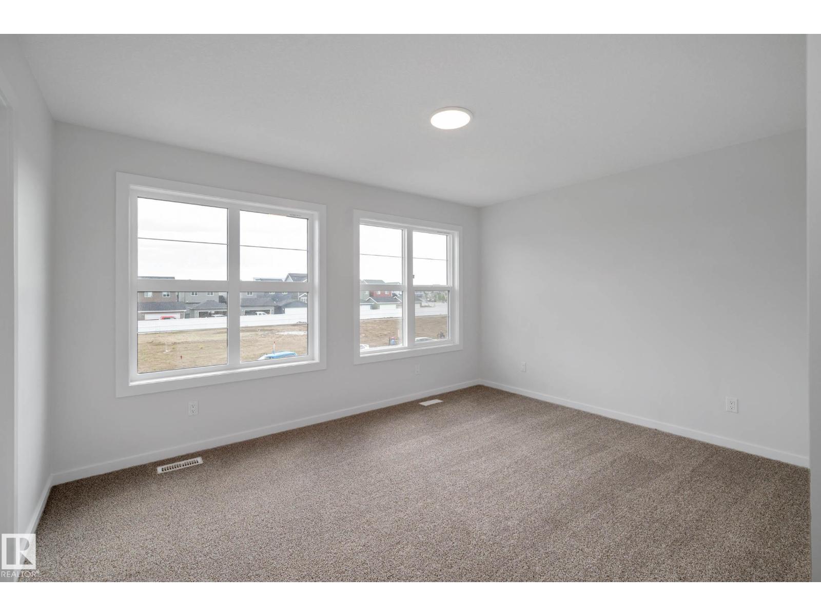 Photo 34 of 303 Stiles Wy, Leduc AB