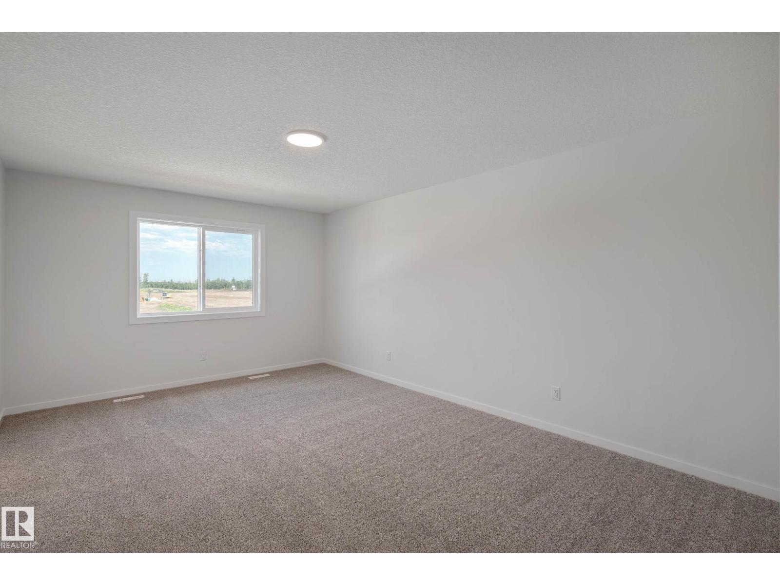 Photo 25 of 303 Stiles Wy, Leduc AB