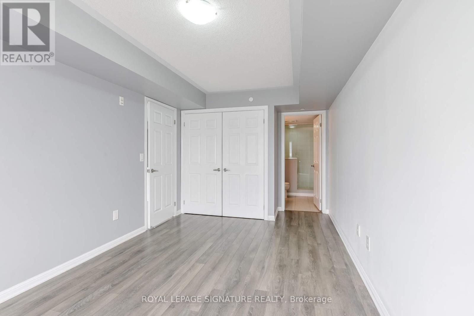 Photo 11 of 408 1045 Nadalin Heights, Milton ON