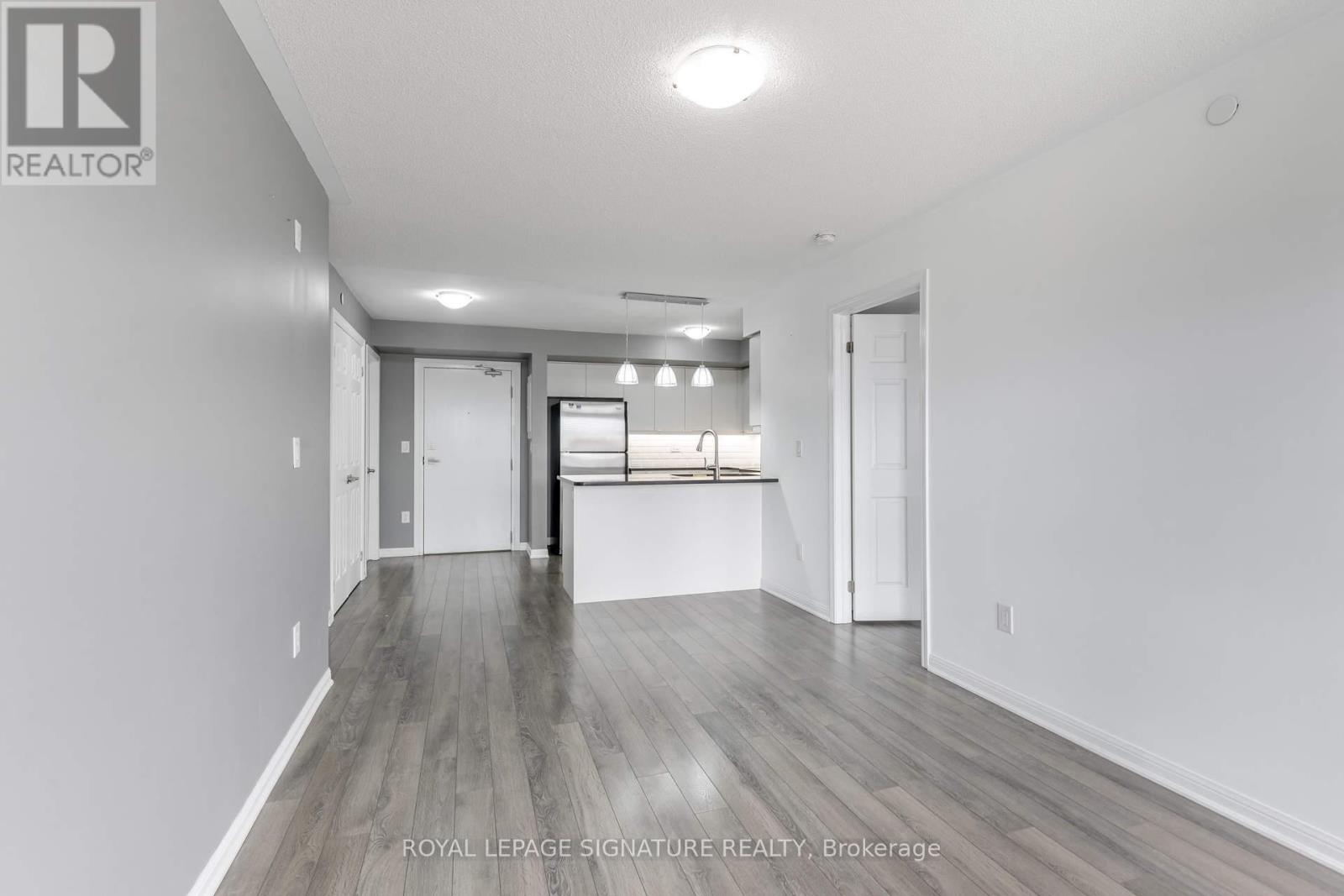 Photo 3 of 408 1045 Nadalin Heights, Milton ON