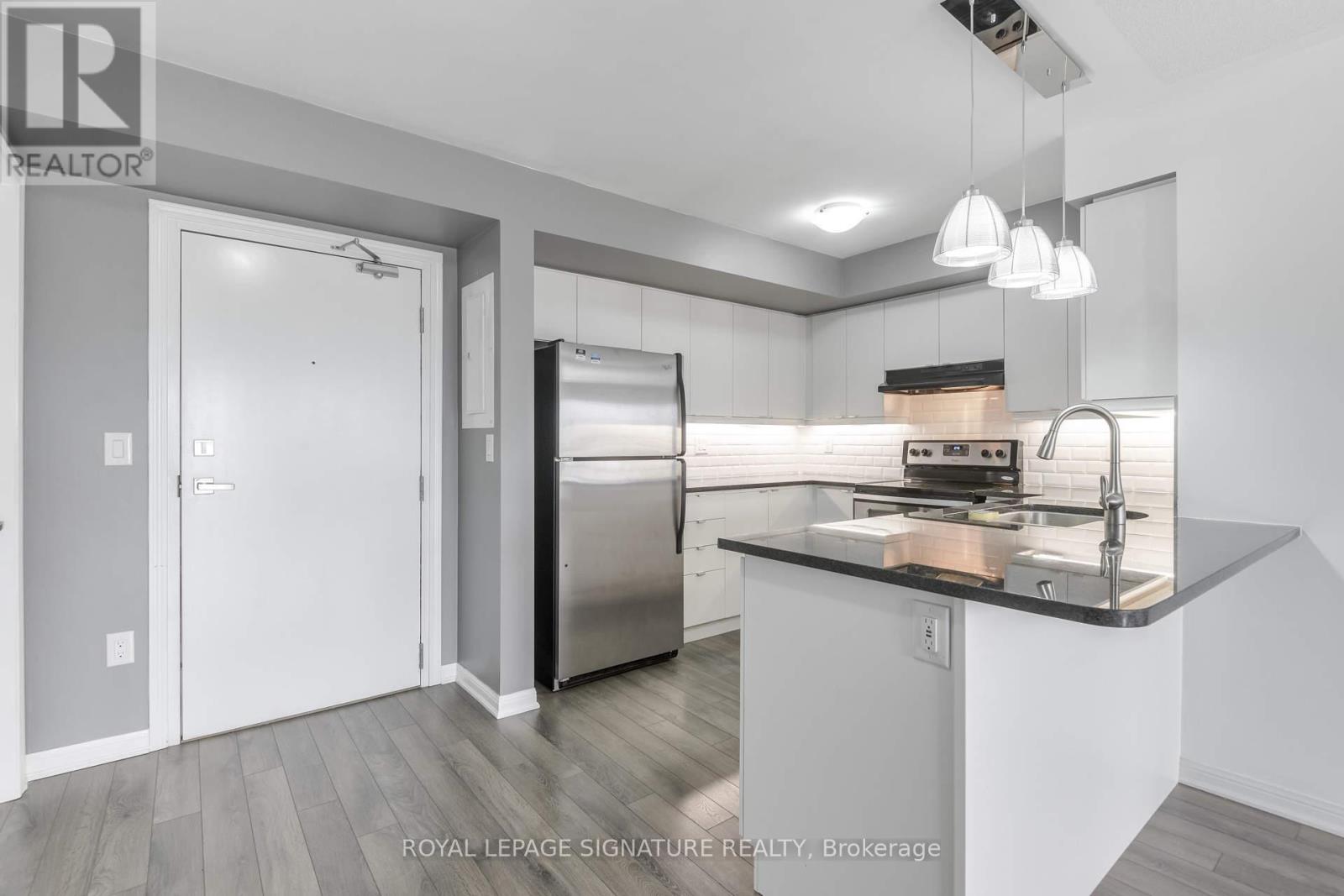 Photo 6 of 408 1045 Nadalin Heights, Milton ON