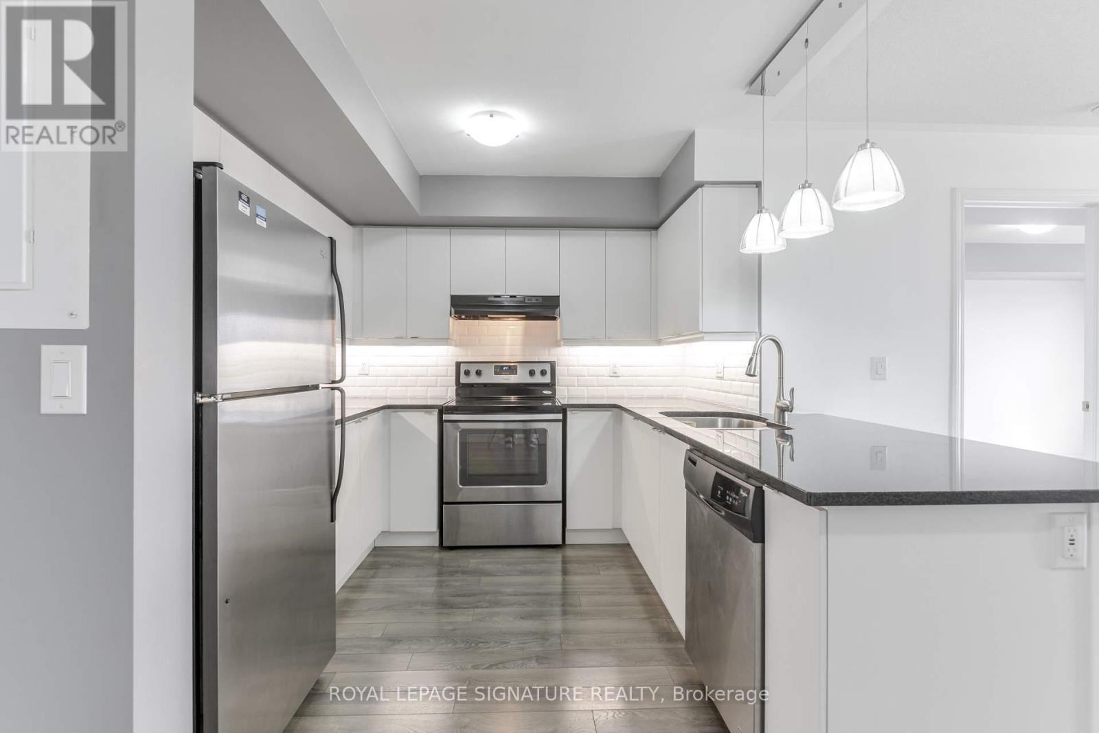 Photo 7 of 408 1045 Nadalin Heights, Milton ON