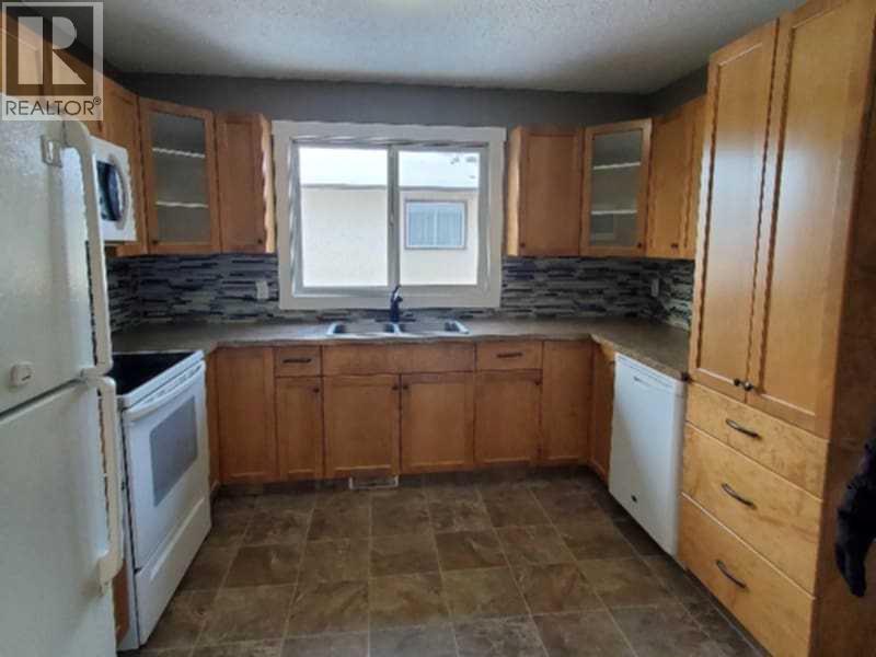 Single Family House Bi-level for Sale in   A Avenue Mountview Grande Prairie 
