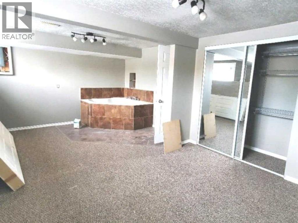Single Family House Bi-level for Sale in   A Avenue Mountview Grande Prairie 