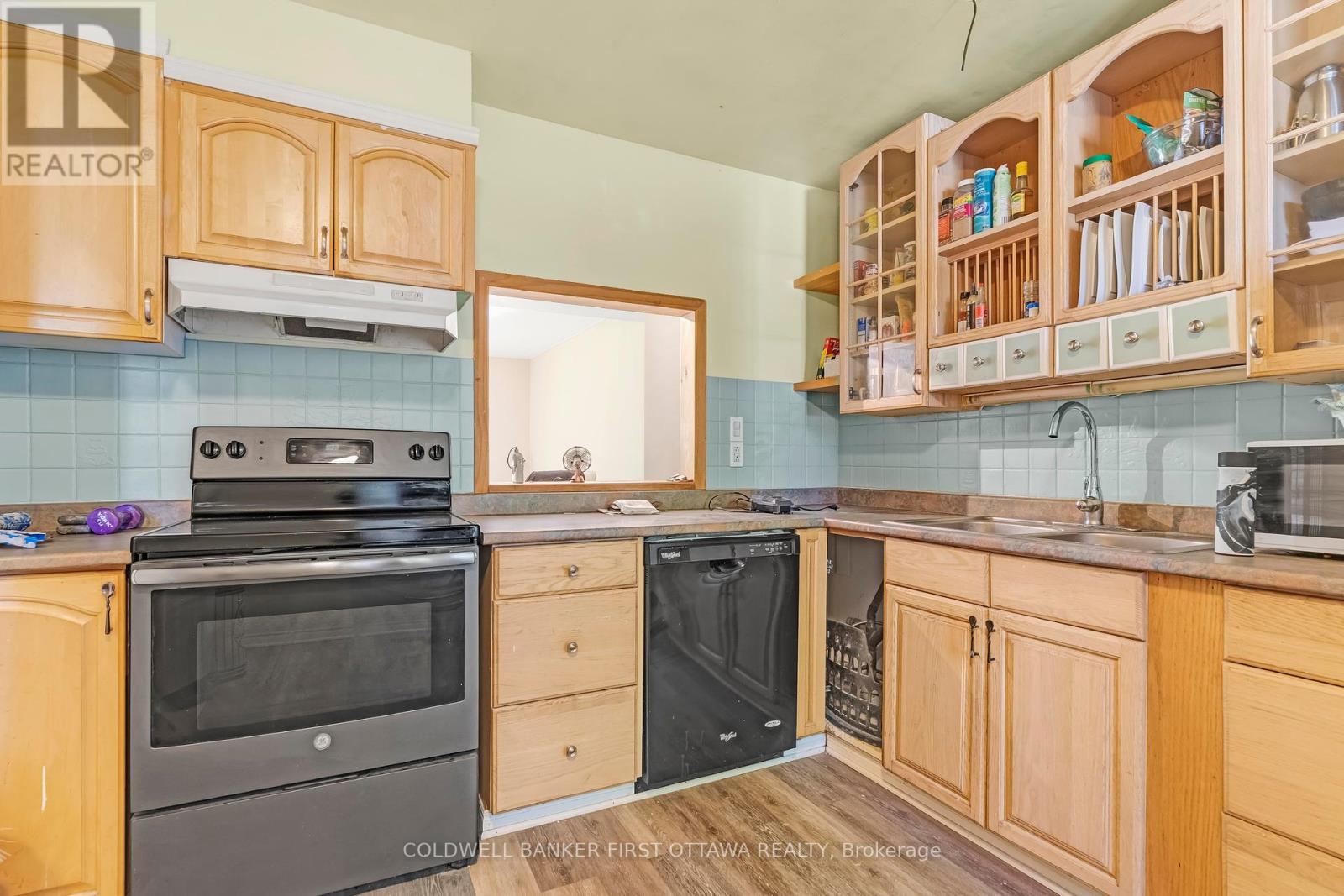 Convenient window to dining room.