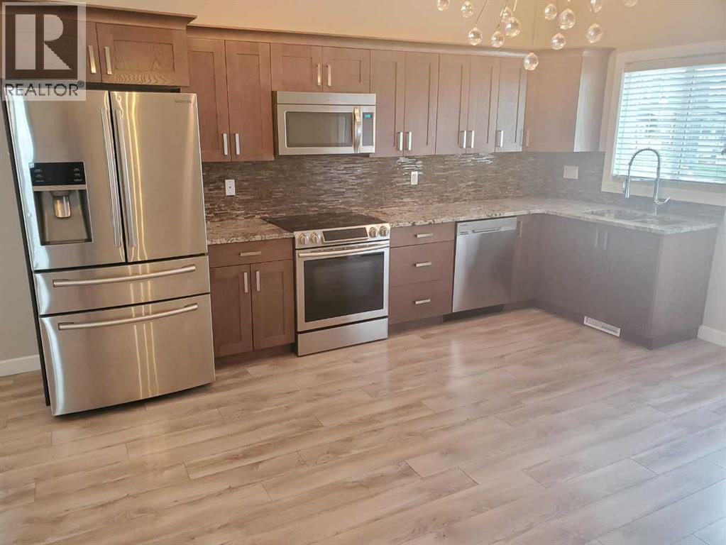 Photo 4 of 10211 125 Avenue, Grande Prairie AB