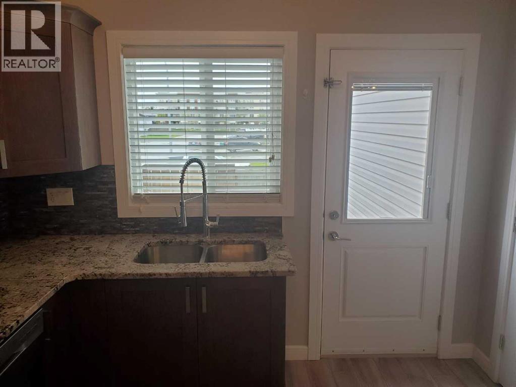 Photo 6 of 10211 125 Avenue, Grande Prairie AB
