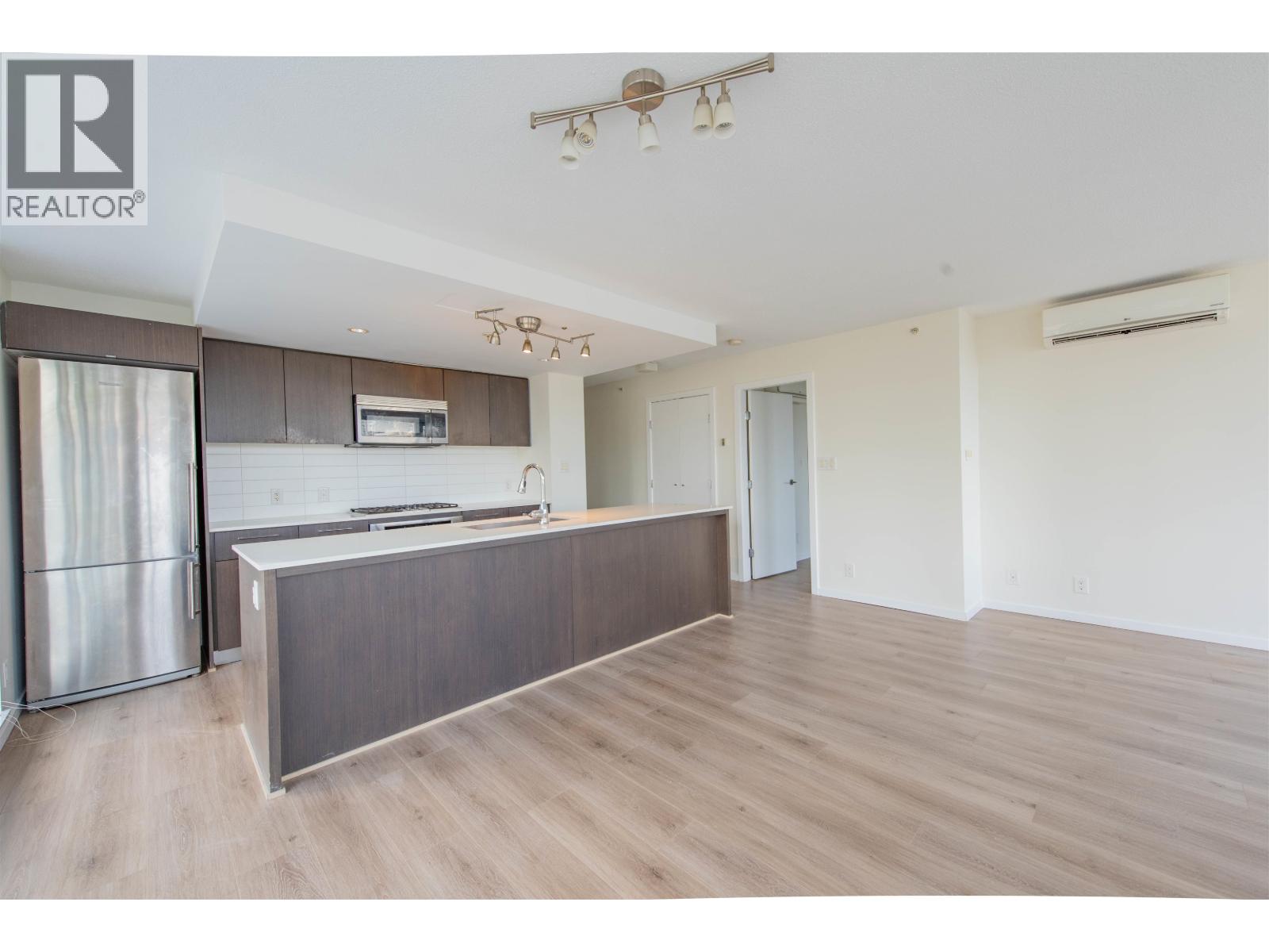 Photo 2 of 511 7988 Ackroyd Road, Richmond BC
