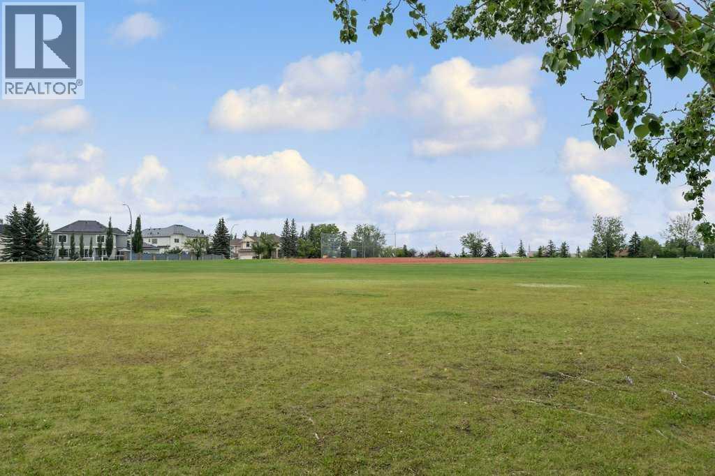 Photo 50 of 208 Coach Side Road Sw, Calgary AB