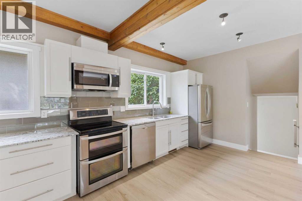 Single Family House 4 Level for Sale in  Gissing Drive SW Glamorgan Calgary 