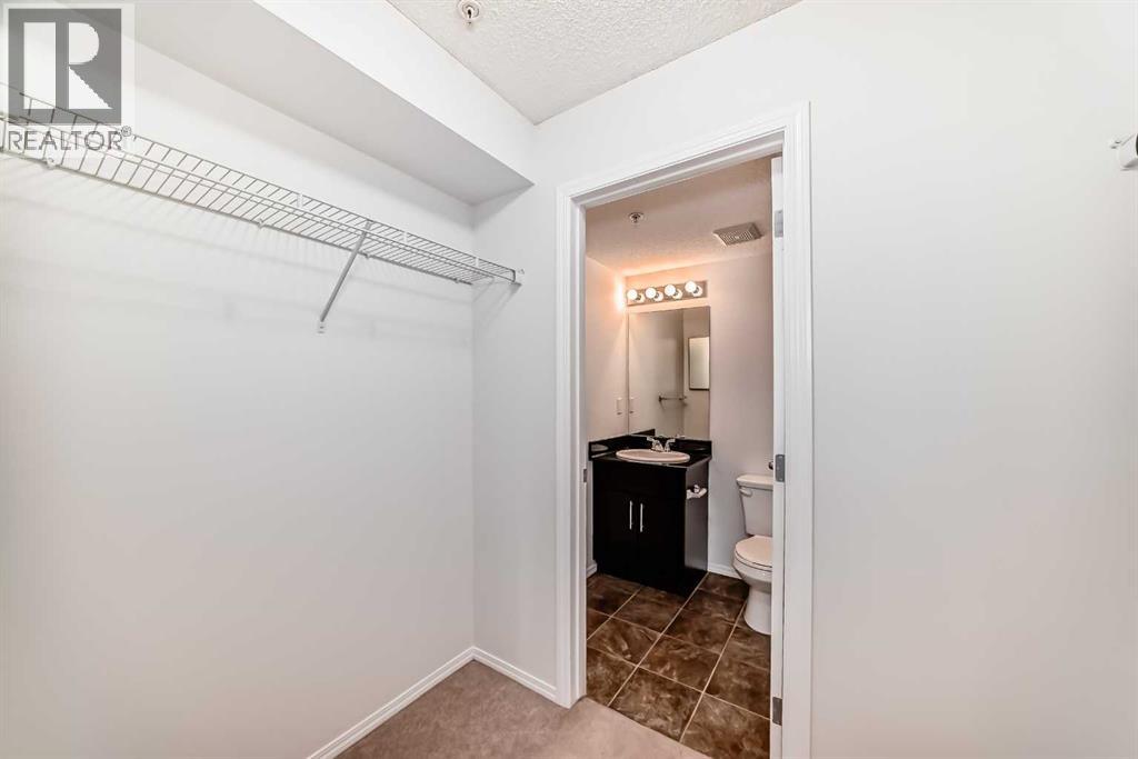 Photo 17 of 9113 403 Mackenzie Way Sw, Airdrie AB