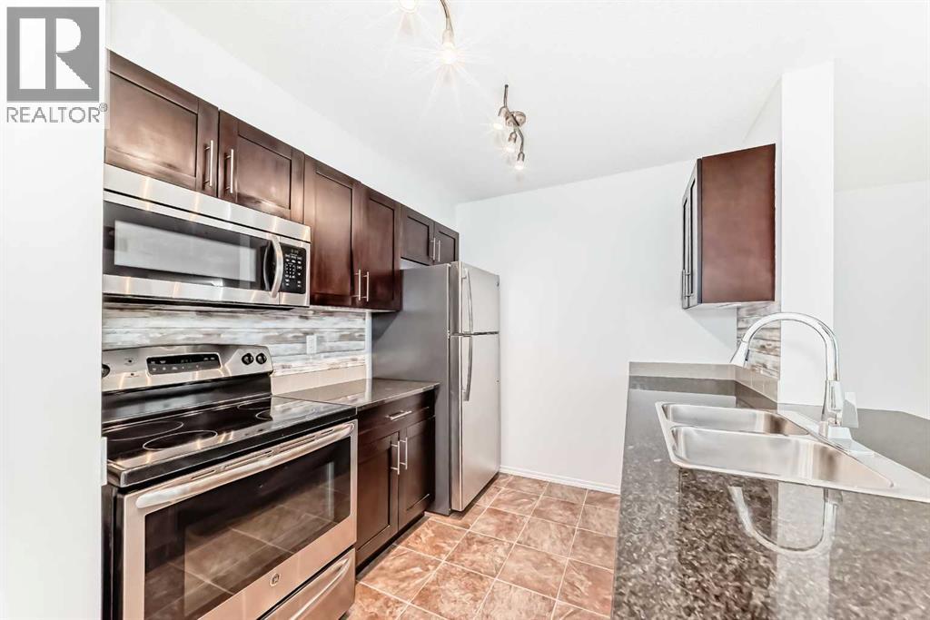 Photo 8 of 9113 403 Mackenzie Way Sw, Airdrie AB