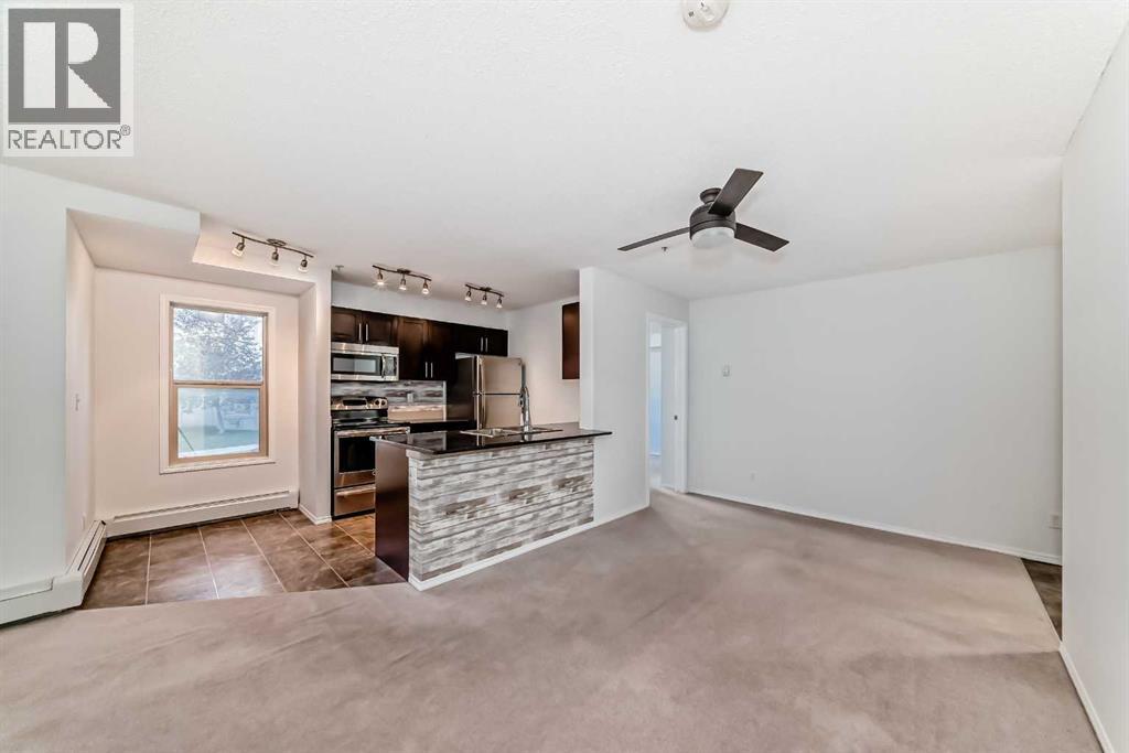 Photo 12 of 9113 403 Mackenzie Way Sw, Airdrie AB