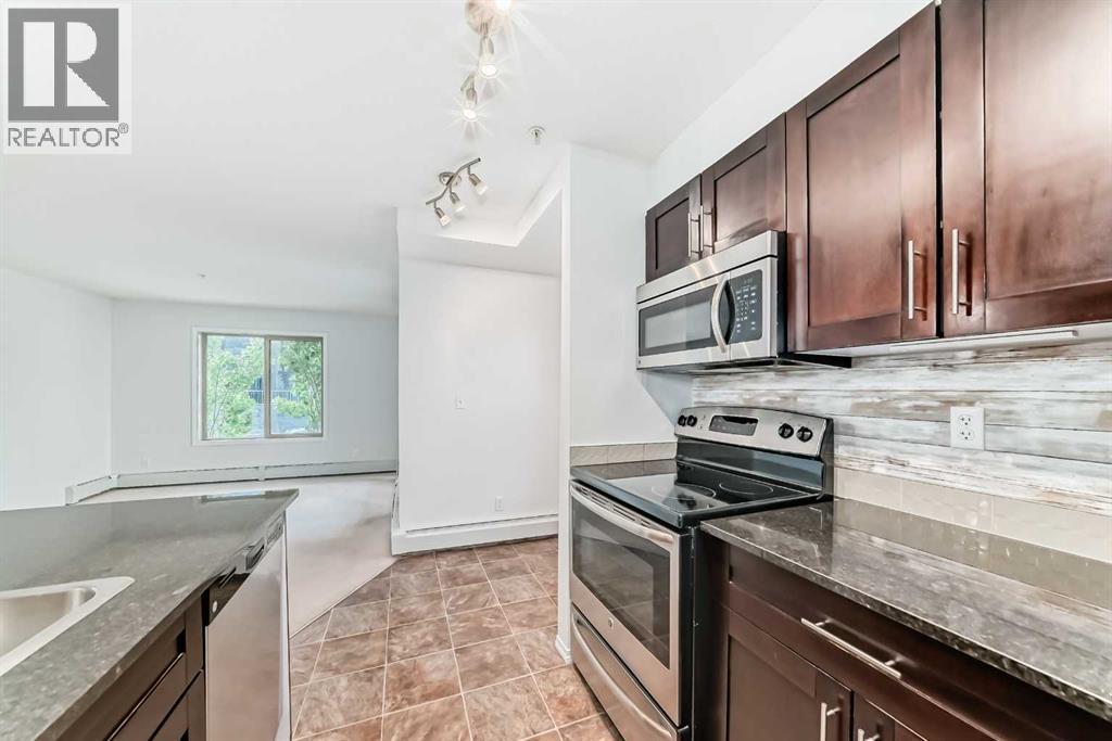 Photo 10 of 9113 403 Mackenzie Way Sw, Airdrie AB