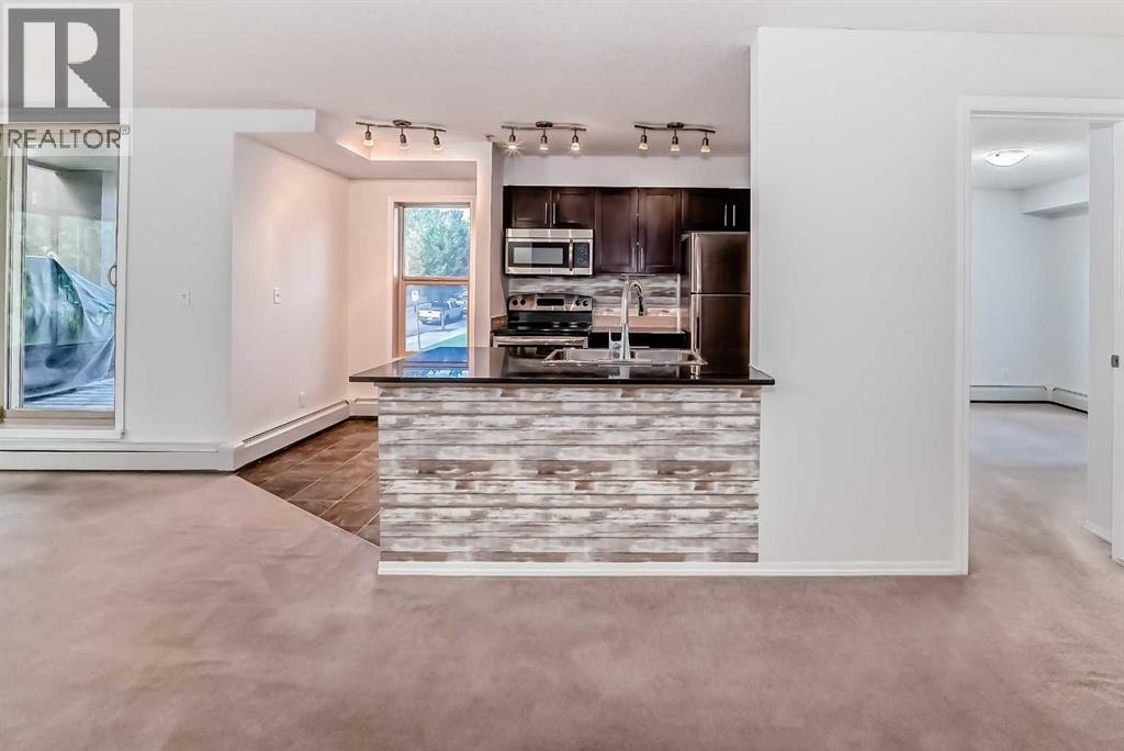 Photo 11 of 9113 403 Mackenzie Way Sw, Airdrie AB