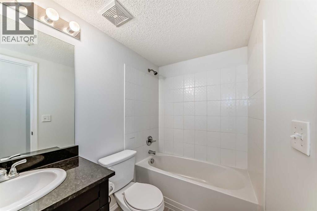 Photo 5 of 9113 403 Mackenzie Way Sw, Airdrie AB