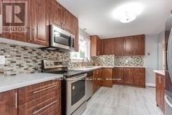 Photo 7 of 19 Tordale Crescent, Toronto ON