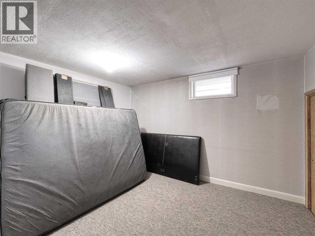 Single Family House Bungalow for Sale in  Grove Hill Road SW Glendale Calgary 