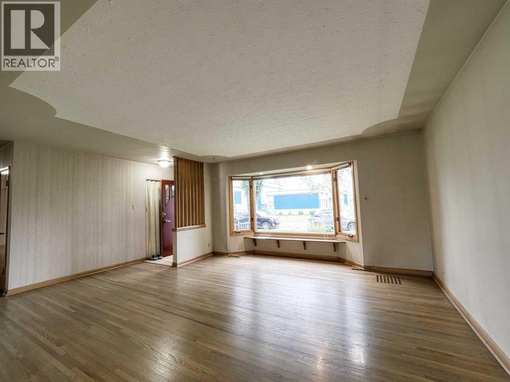 Single Family House Bungalow for Sale in  Grove Hill Road SW Glendale Calgary 
