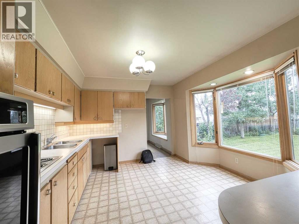Single Family House Bungalow for Sale in  Grove Hill Road SW Glendale Calgary 