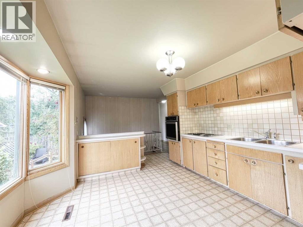 Single Family House Bungalow for Sale in  Grove Hill Road SW Glendale Calgary 
