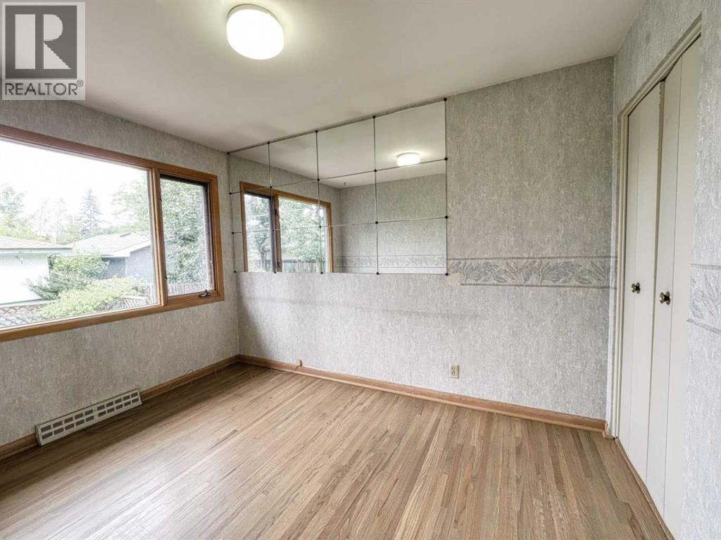 Single Family House Bungalow for Sale in  Grove Hill Road SW Glendale Calgary 
