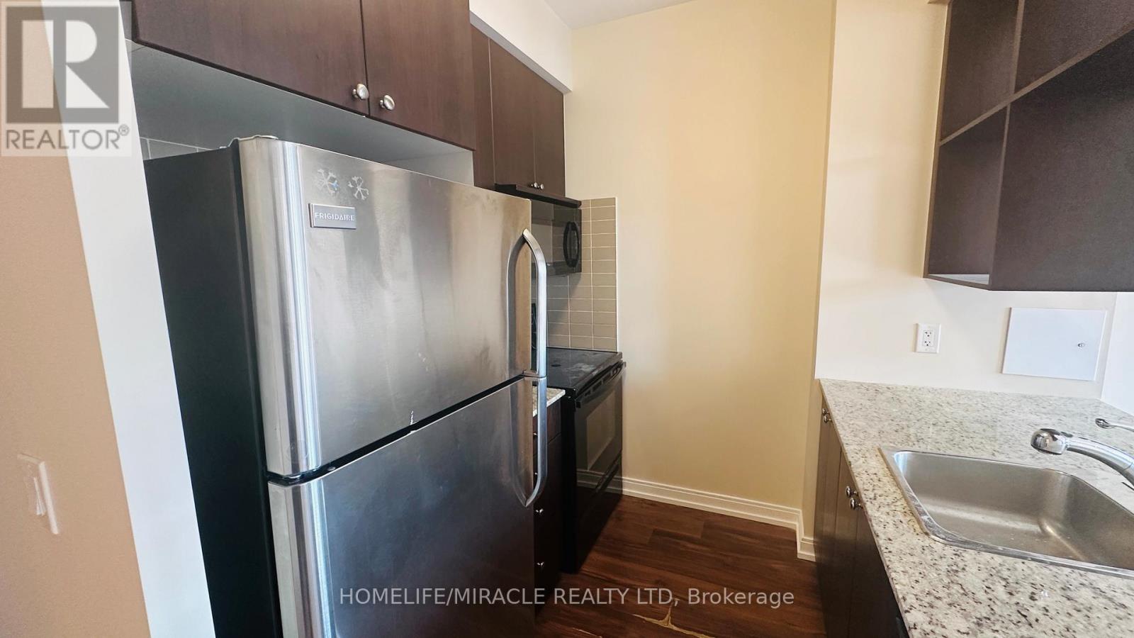 Photo 5 of 304 151 Village Green Square, Toronto ON