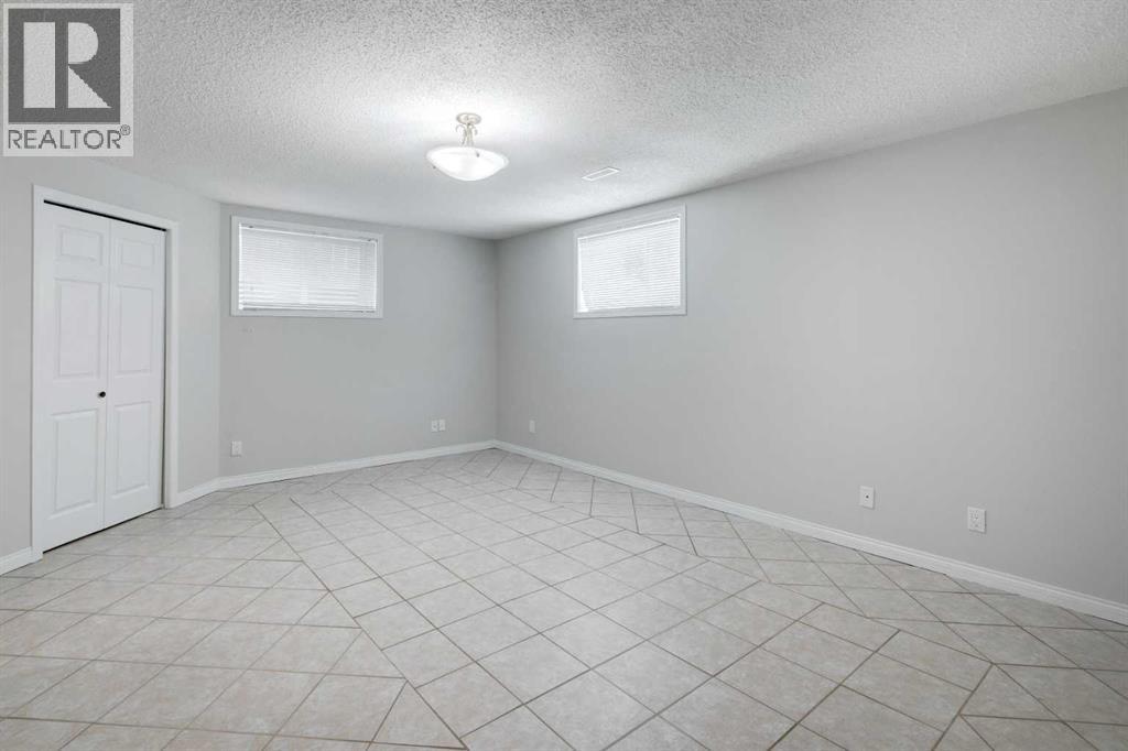 Photo 30 of 26 Rocky Ridge Heights Nw, Calgary AB